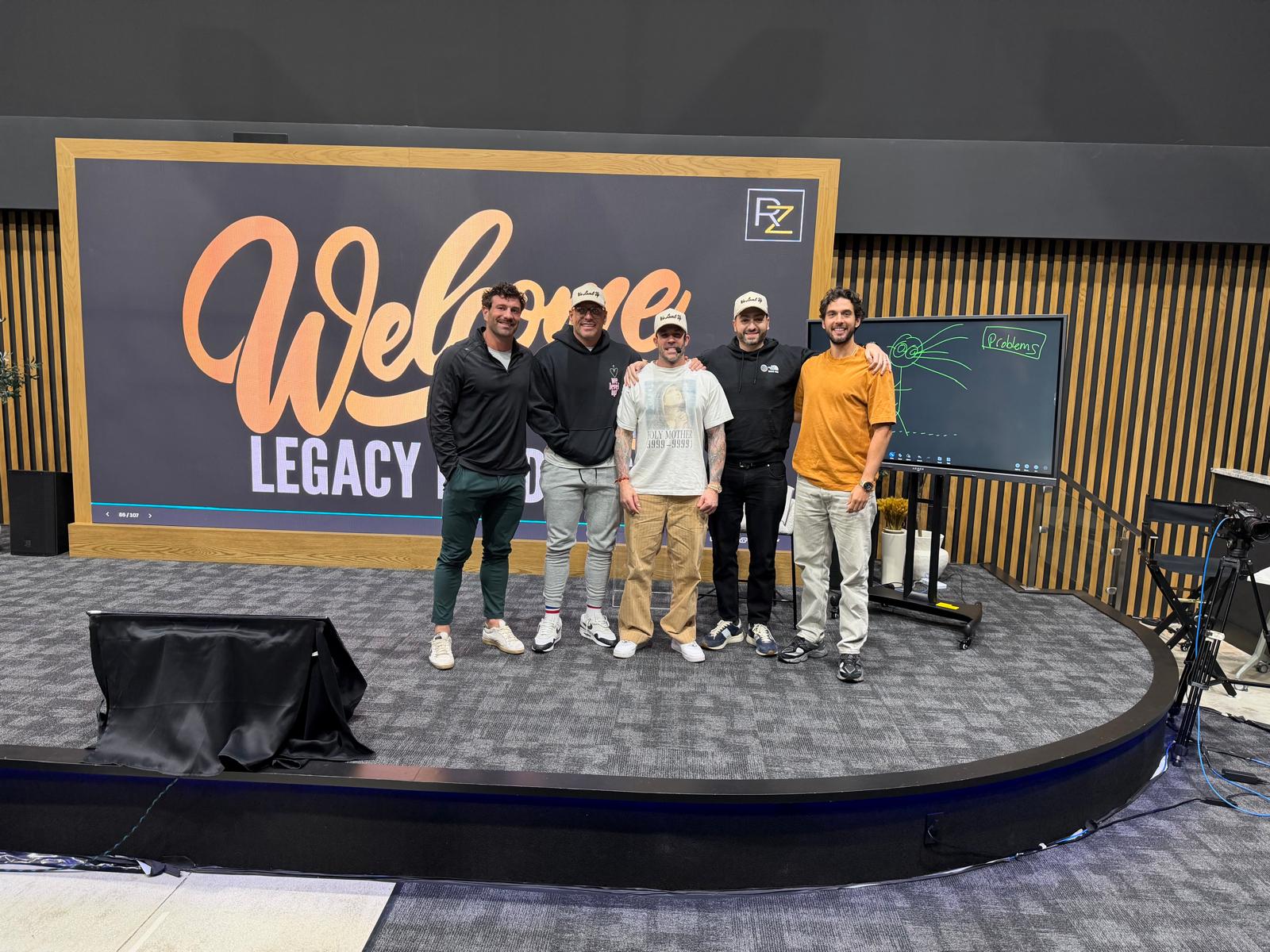 WeLevelUp team on stage at Legacy Bound event